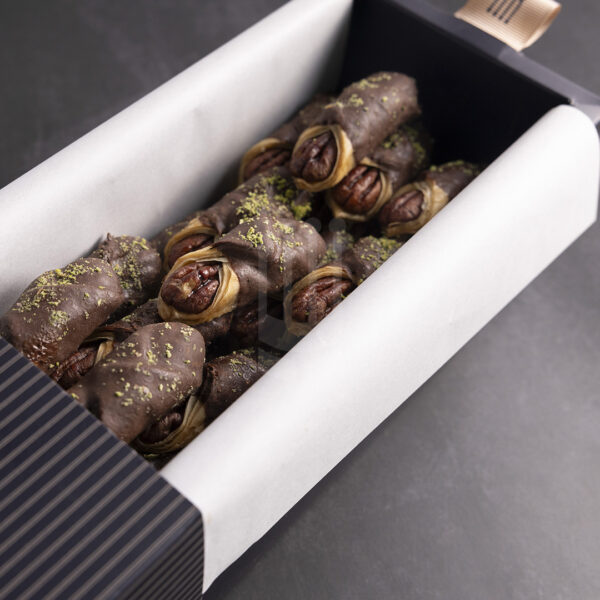 Kahraman Catering Baklawa with Pecan dipped in chocolate. Enjoy the crunchy & yummy taste