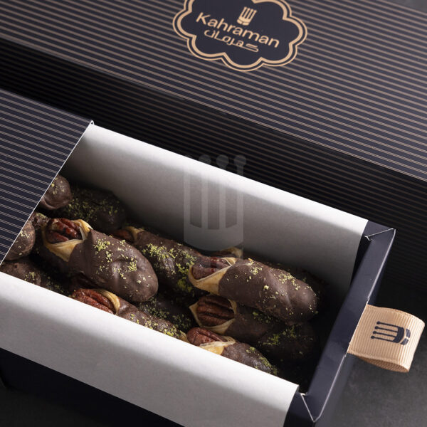 Kahraman Catering Baklawa with Pecan dipped in chocolate. Enjoy the crunchy & yummy taste