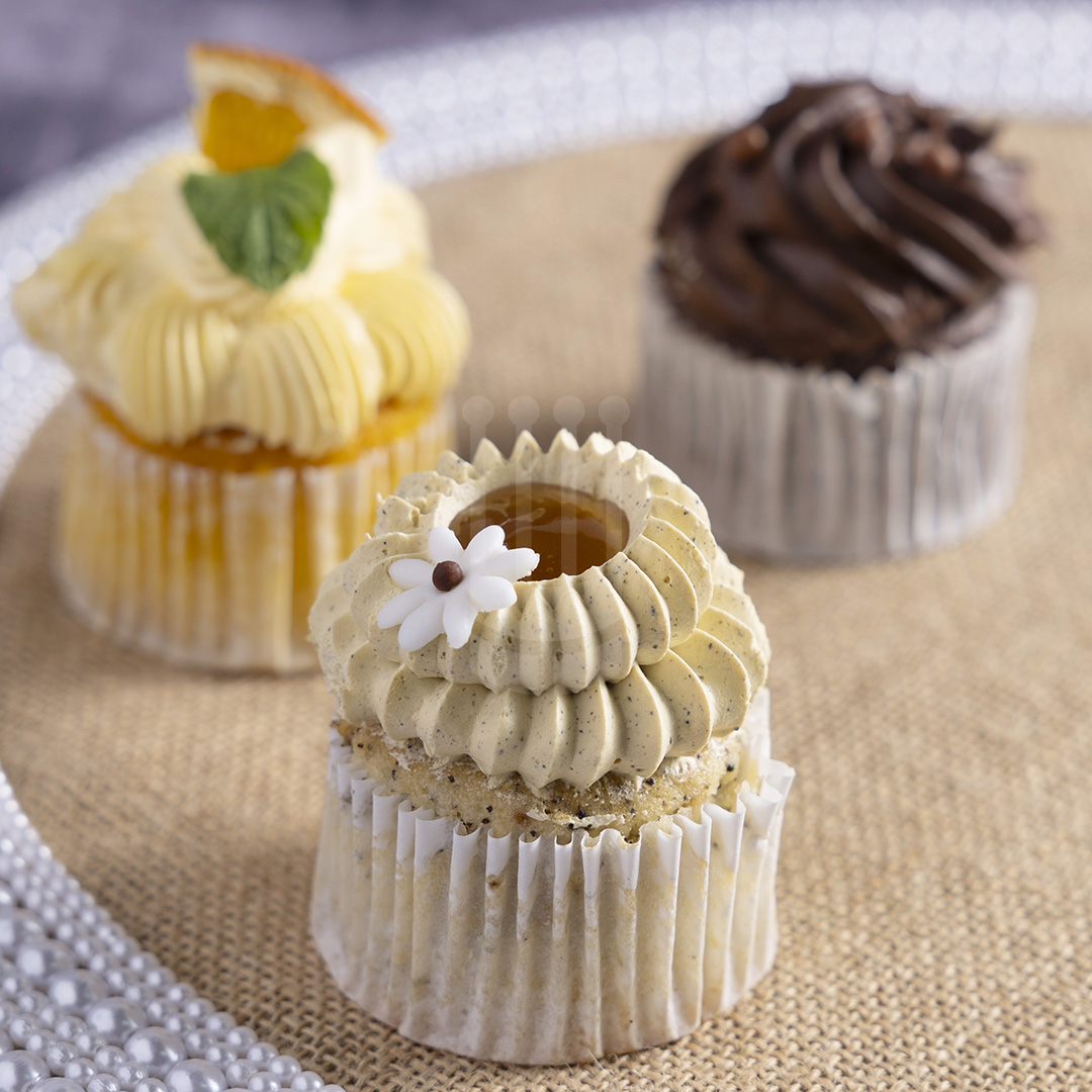 Kahraman catering selection of fine cupcakes comes in different flavors like Strawberry, Orange, Lemon, chocolate, Oreo & English Tea